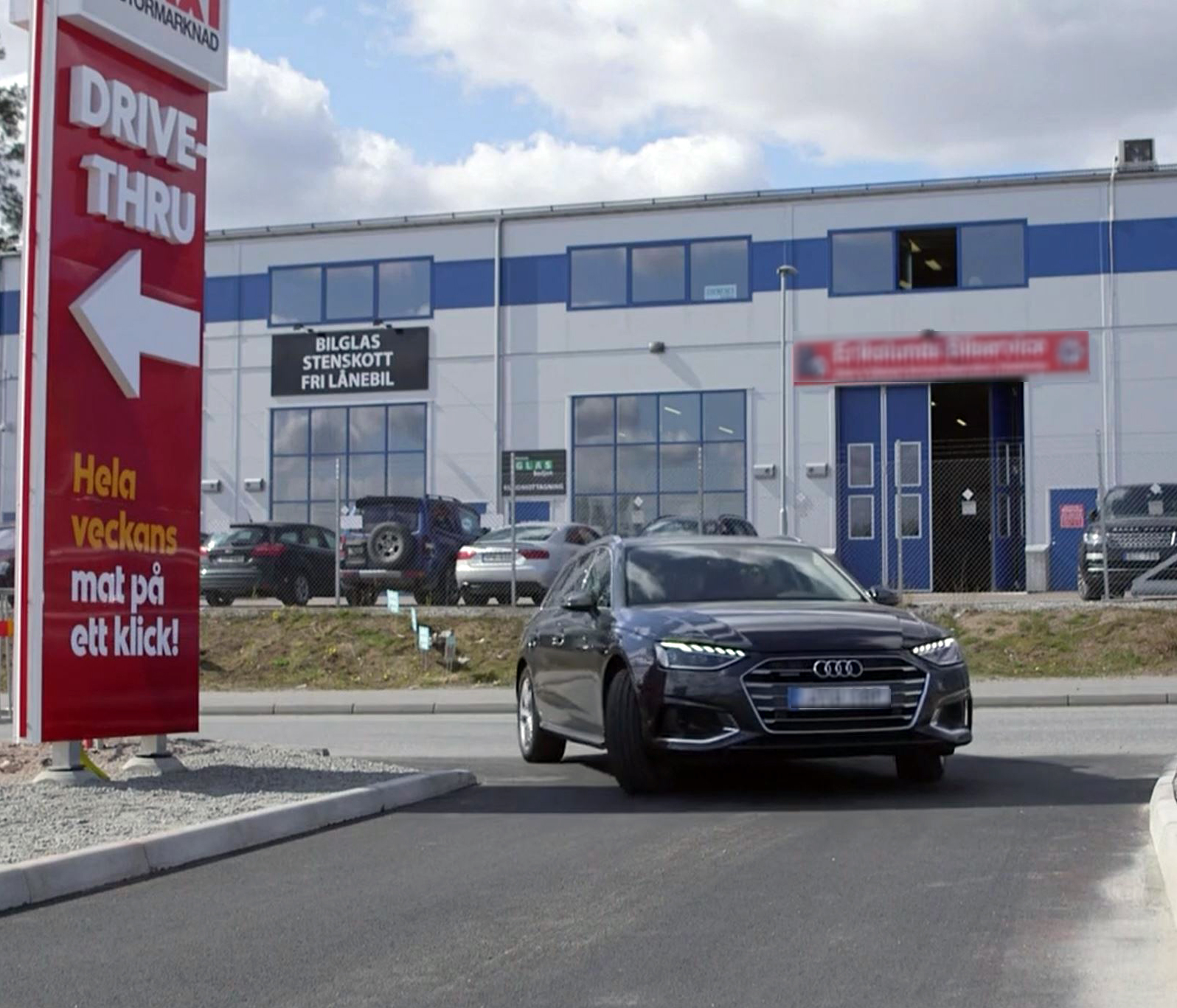 A car approaching the order pick-up point