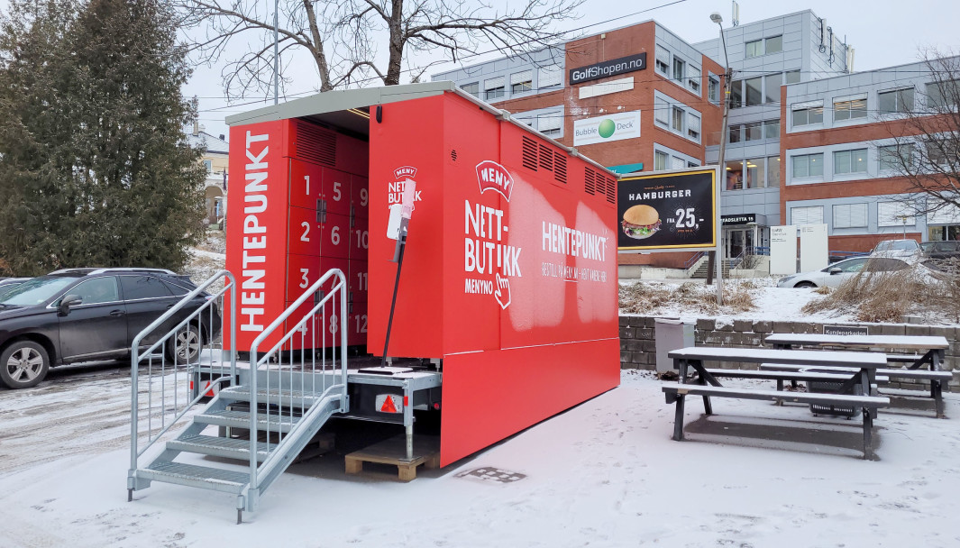 A red mobile grocery locker from Meny